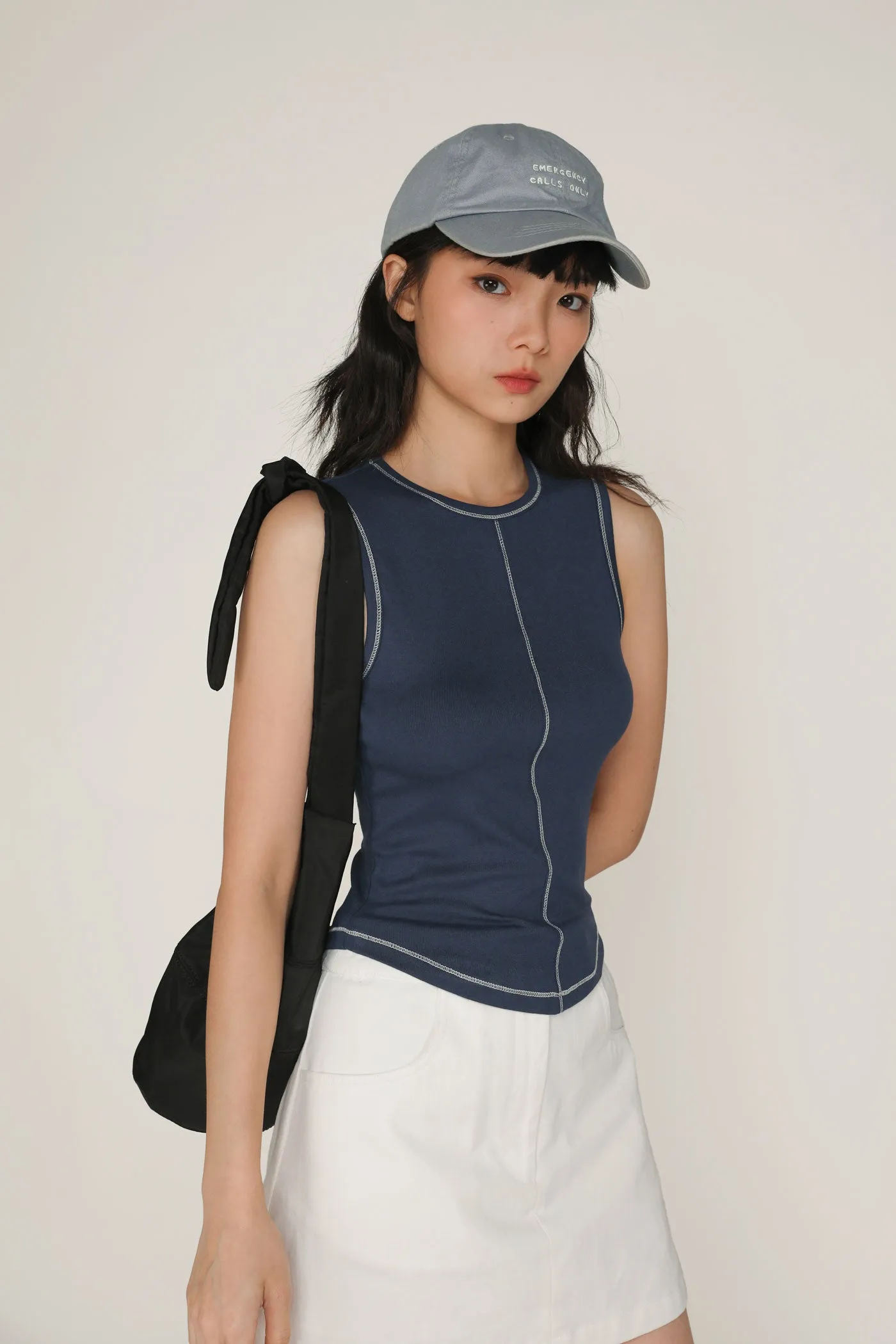 Rory Contrast Stitching Curved Hem Top Limited Edition