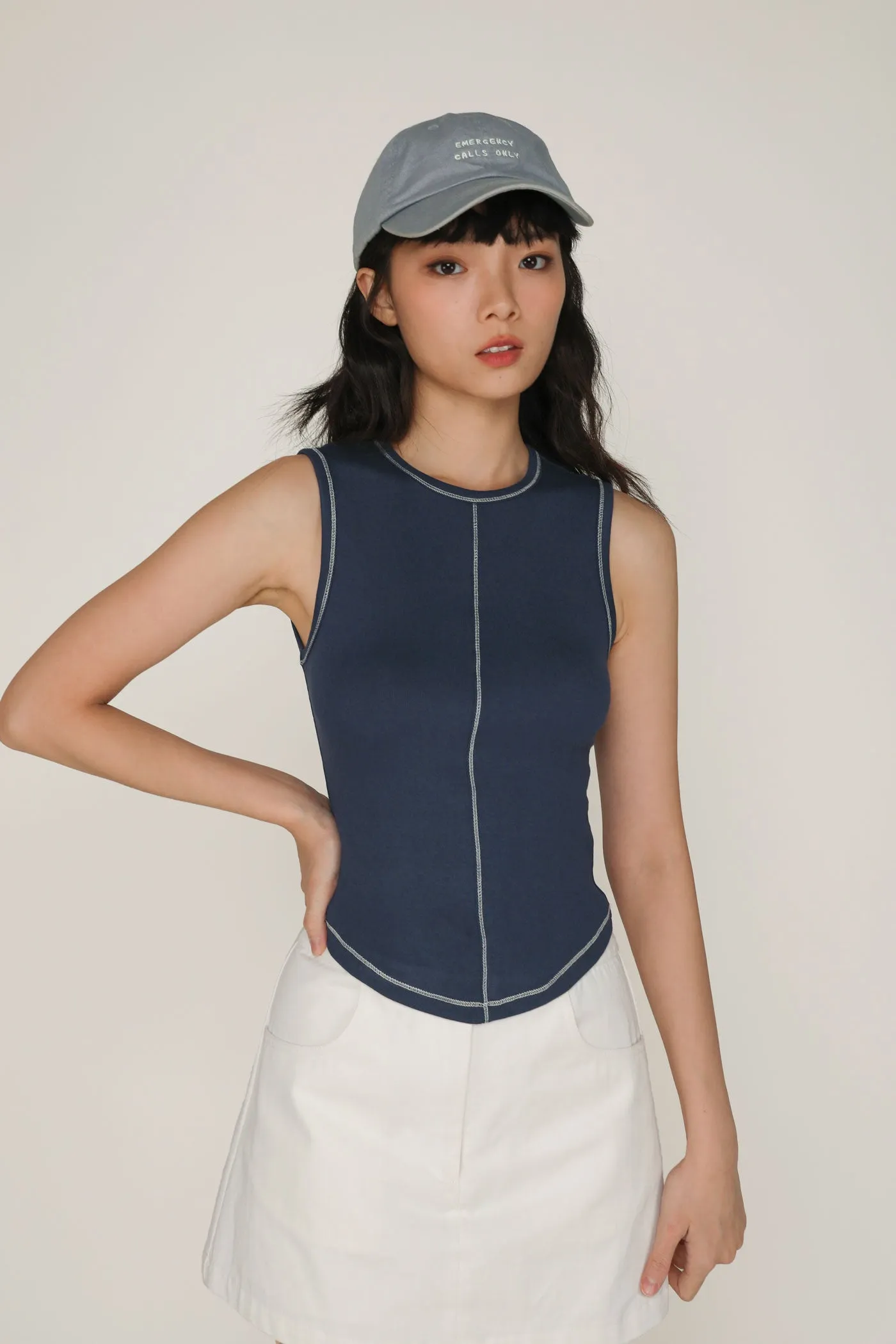 Rory Contrast Stitching Curved Hem Top Limited Edition