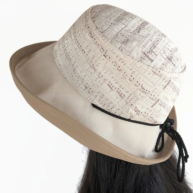 Sunblocker UV summer hat sun hat with wide brim, natural notes print, adjustable fit
